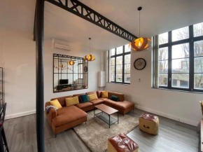 Magnifique loft 4 chambres avec parking intérieur